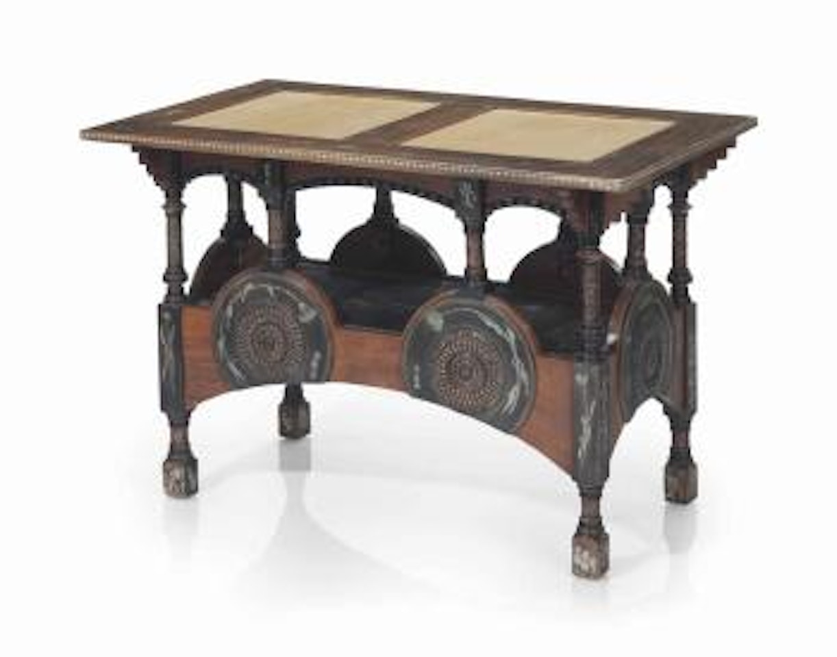 An occasional table by Carlo Bugatti