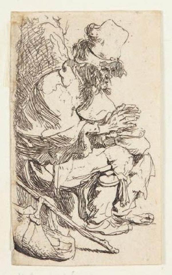 Gueux assis au bas d’un mur se chauffant les mains by Attributed to Rembrandt Harmensz van Rijn