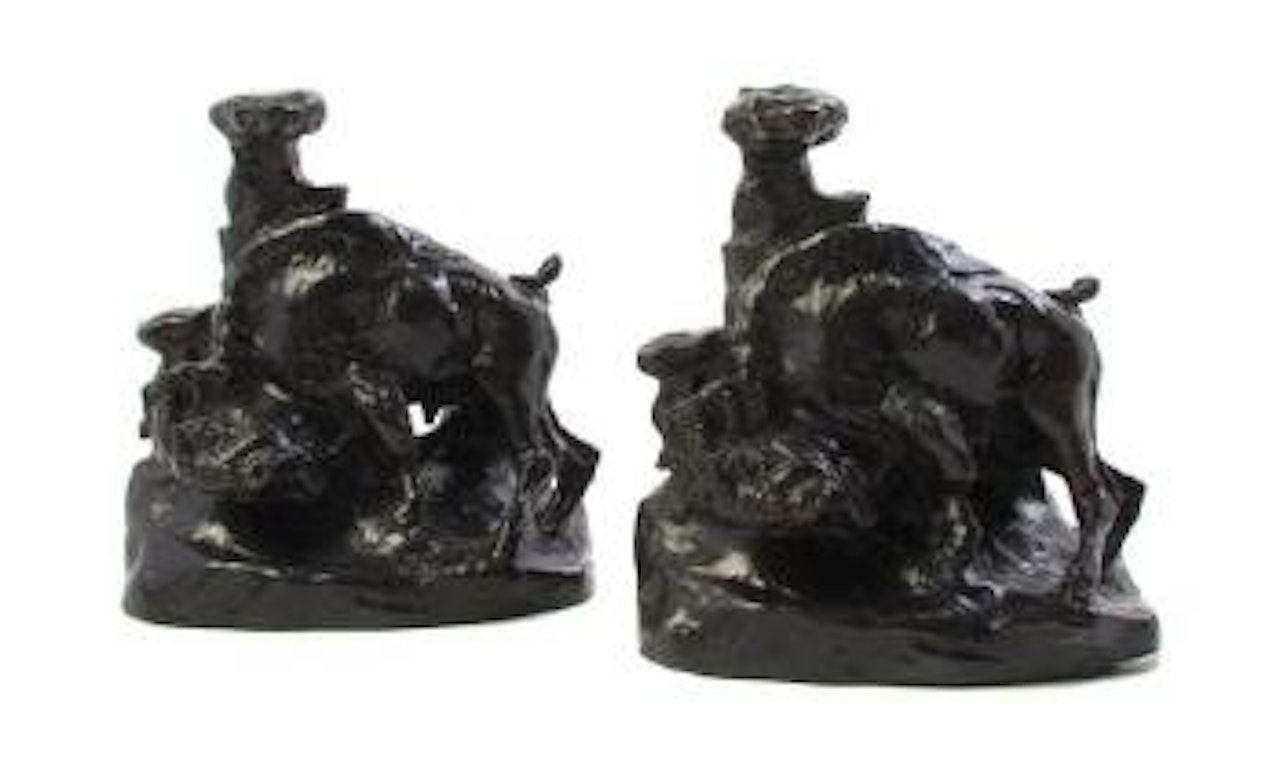 A pair of bookends by Charles M Russell