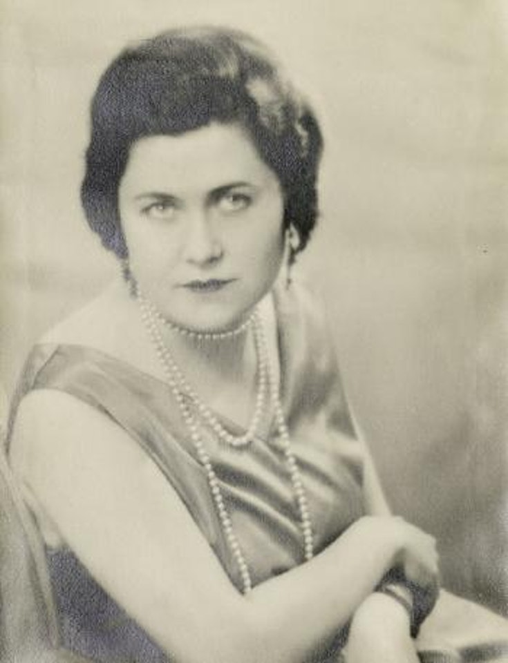 Portrait of a woman with pearls by Man Ray