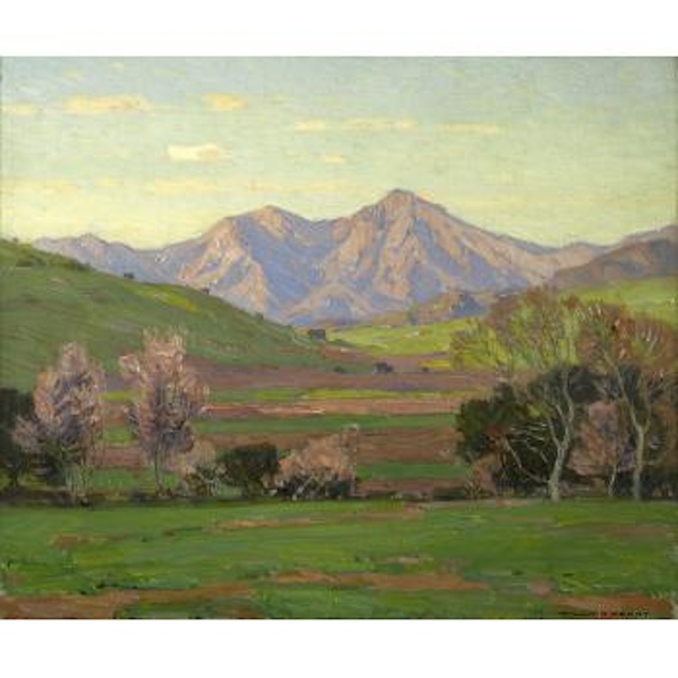 Verdant landscape with mountains beyond by William Wendt