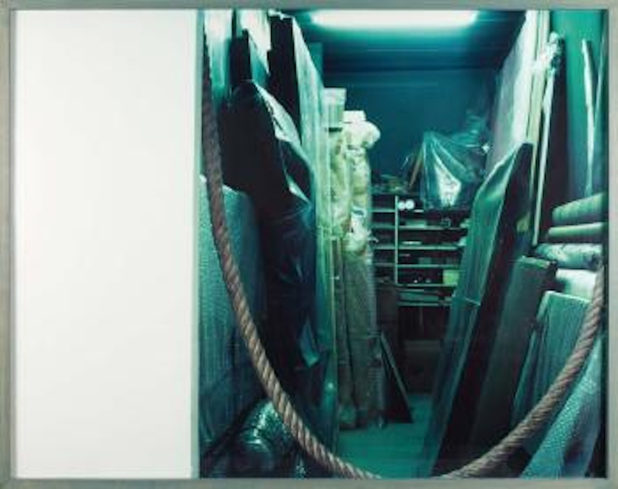 White wall and storage (green) by Louise Lawler