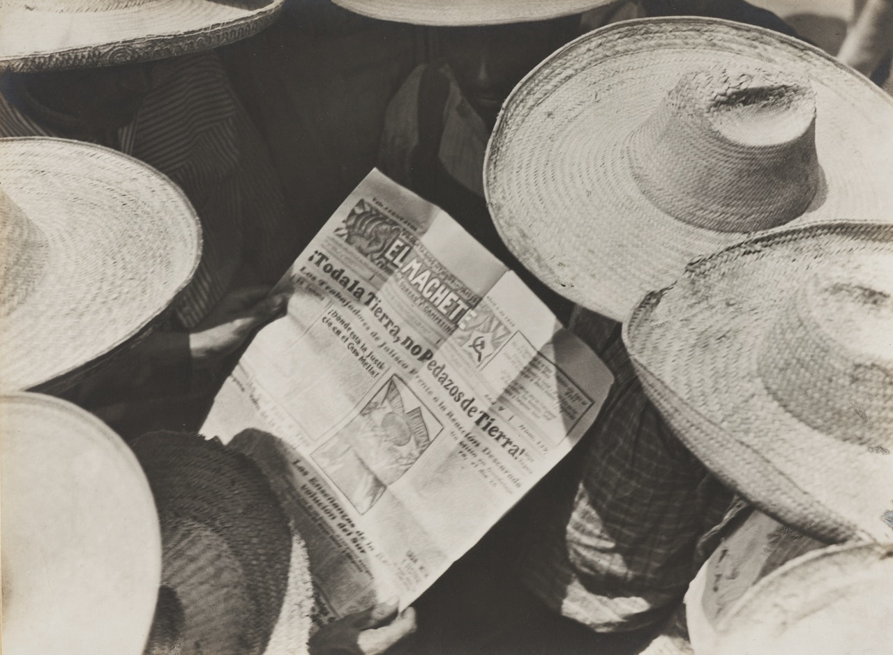 CAMPESINOS READING EL MACHETE by Tina Modotti