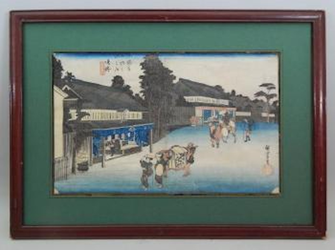 Station 41, Narumi, femme transportée dans un kago suivie d’un cavalier by Utagawa Hiroshige