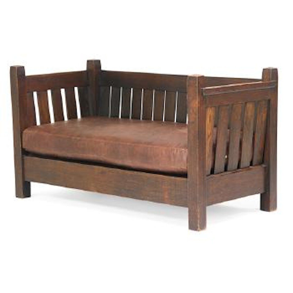 Early crib settle by Gustav Stickley