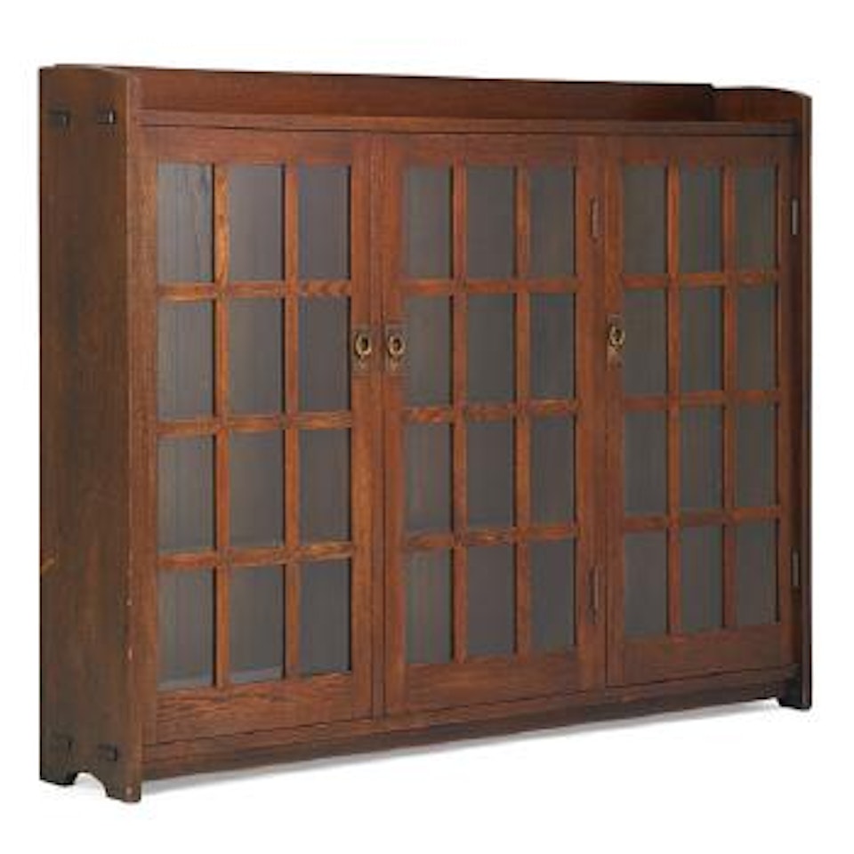 Early triple-door bookcase with mitered mullions by Gustav Stickley