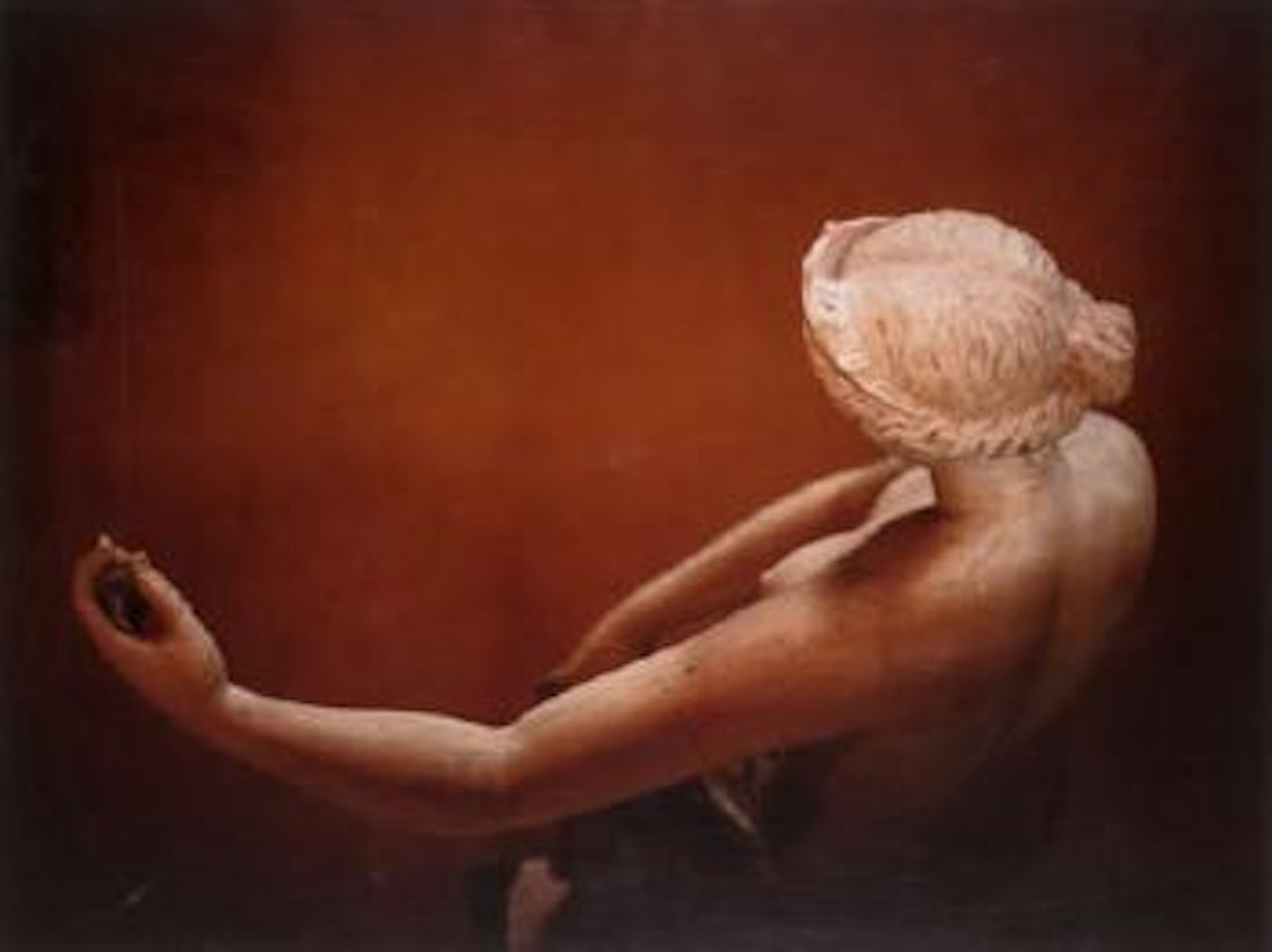 Woman (statue) from above by Louise Lawler