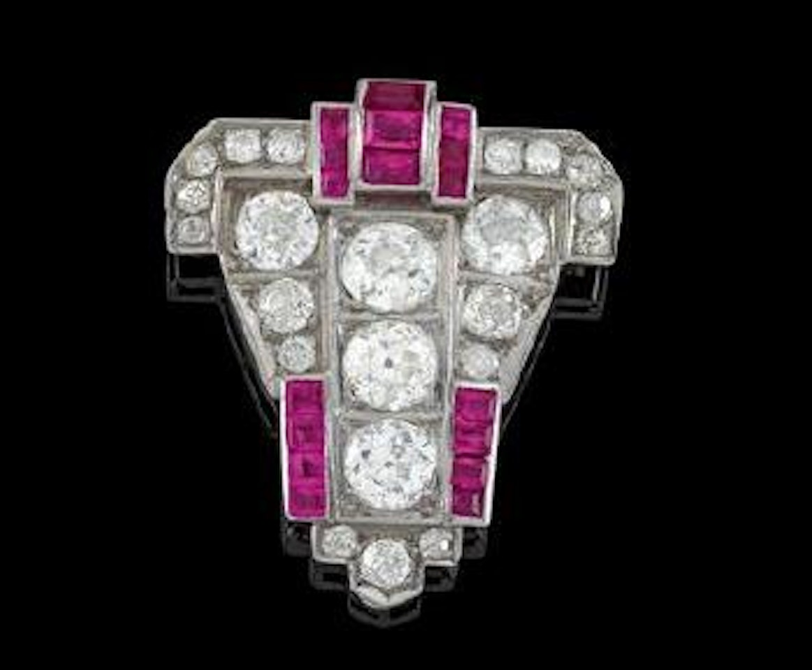 A diamond and ruby clothing clip by Unknown Jewelry Maker