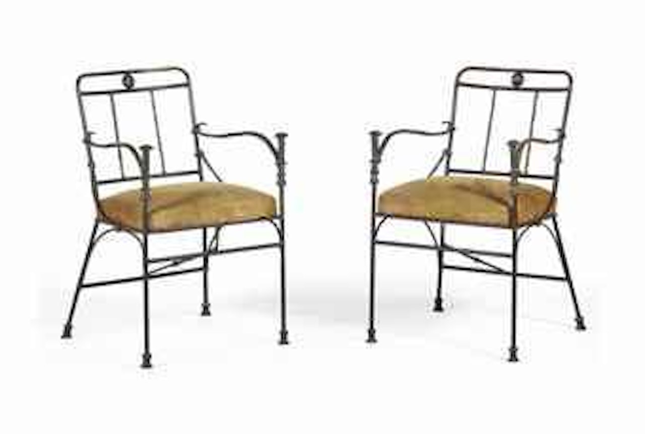 Paire de fauteuils aux pommeaux de canne by Diego Giacometti