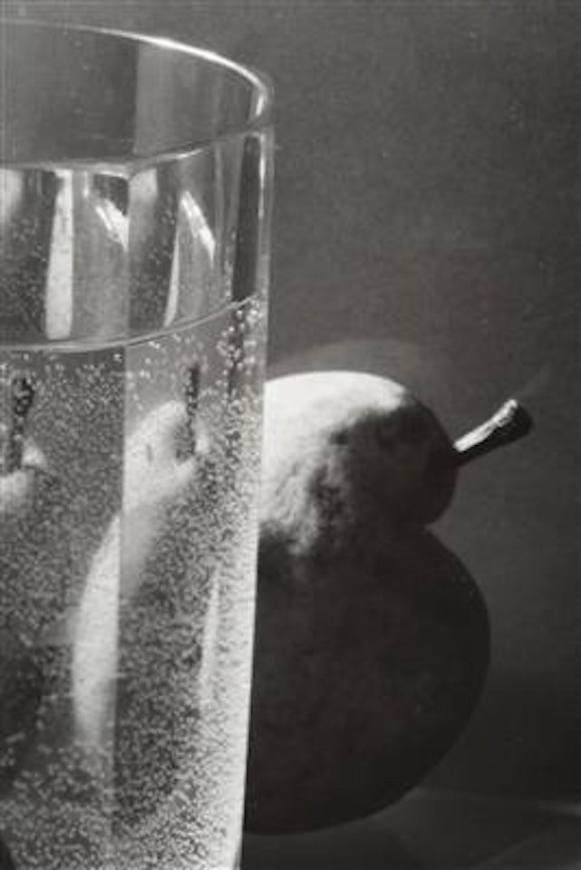 Still life with a glass and fruit by Josef Sudek