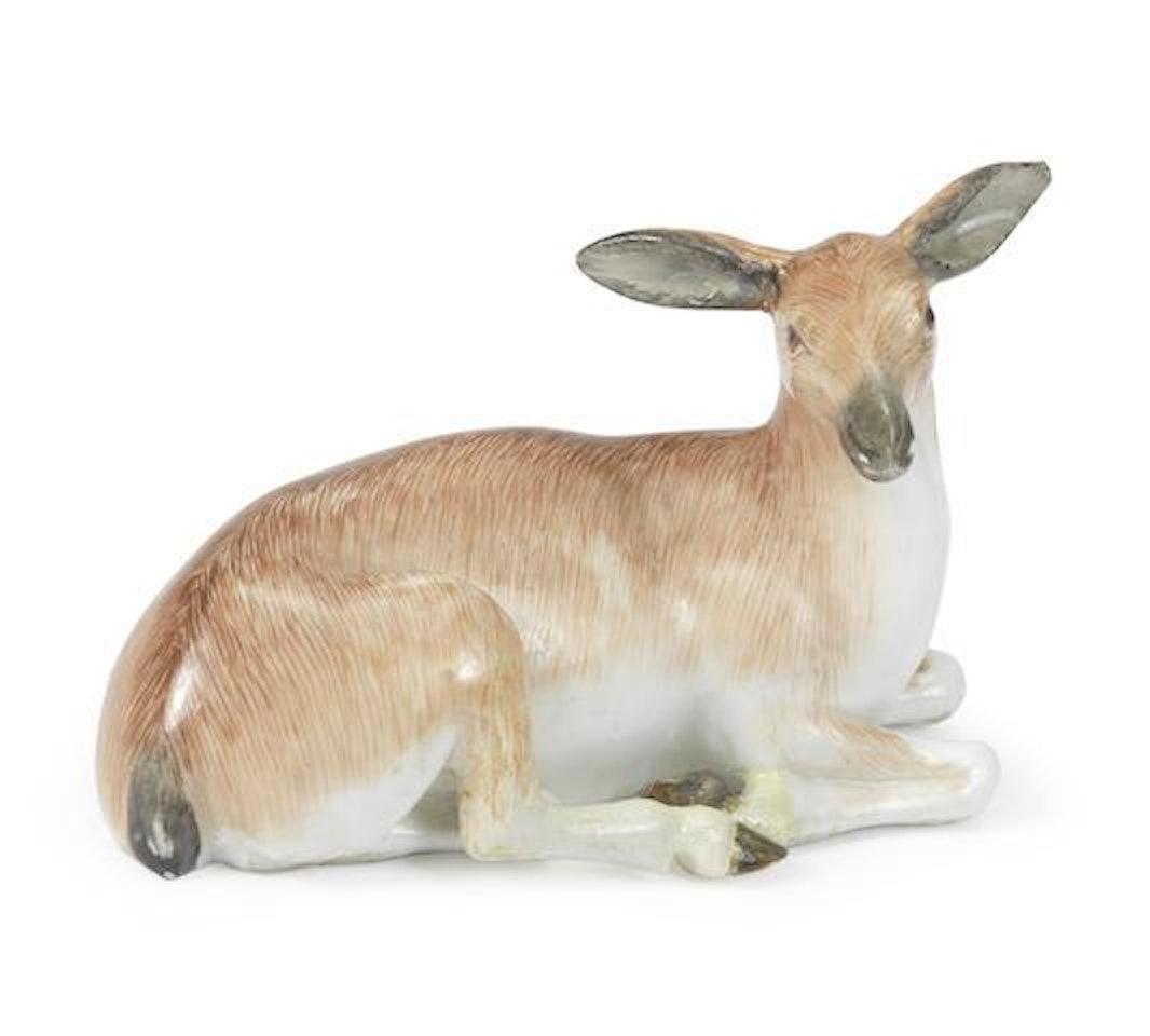 A recumbent deer by Johann Joachim Kändler