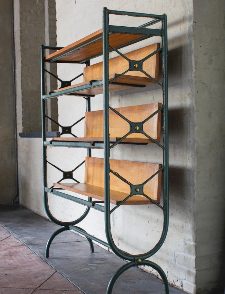 Book Rack by Jacques Adnet