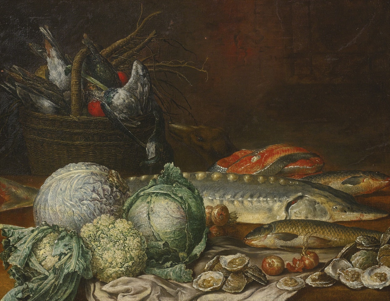 STILL LIFE WITH A STURGEON, OYSTERS, LETTUCE AND A BASKET OF FISH ON A TABLE by French School