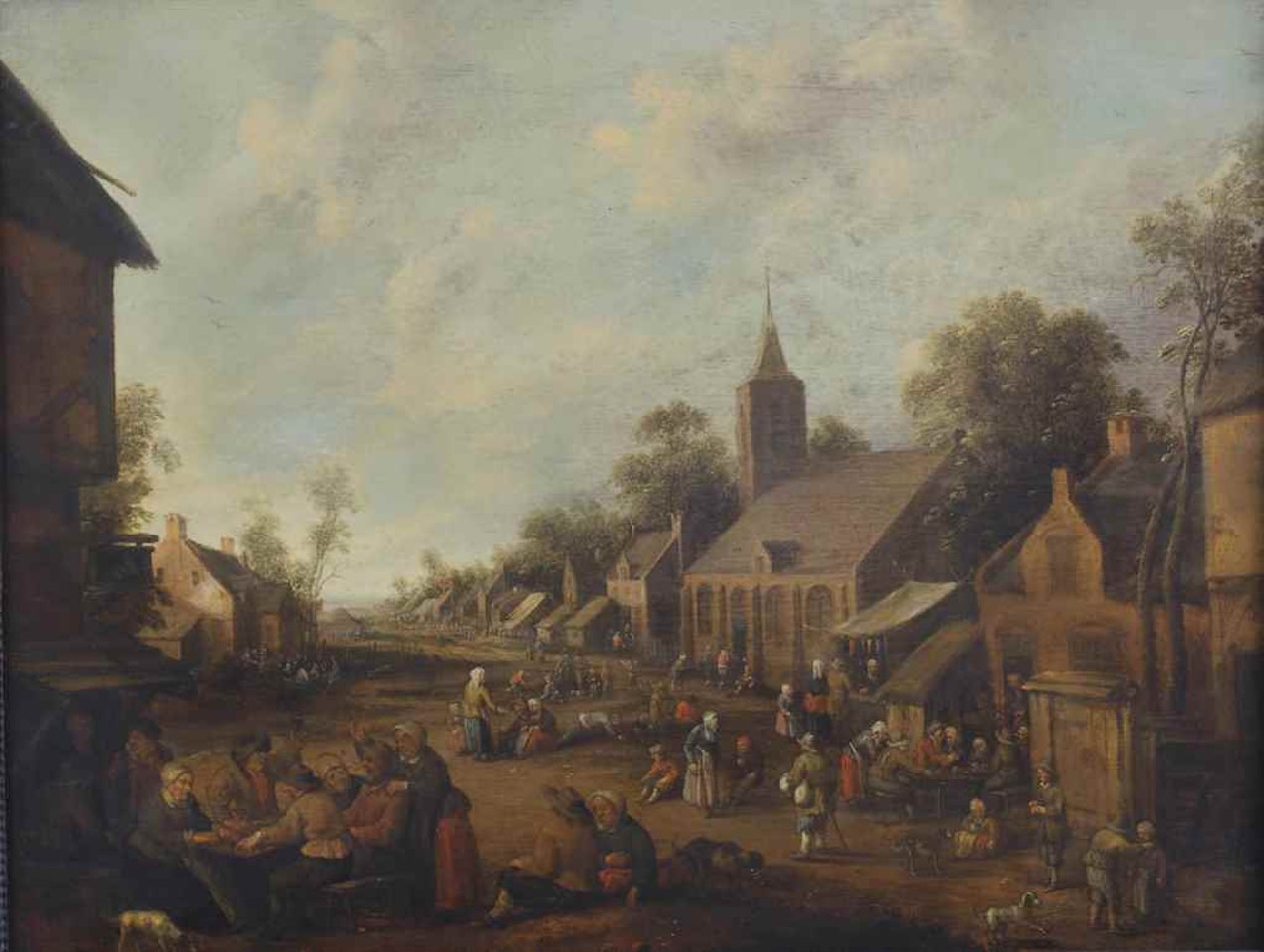 A busy townscape with peasants conversing and drinking, a church beyond by Joost Cornelisz Droochsloot
