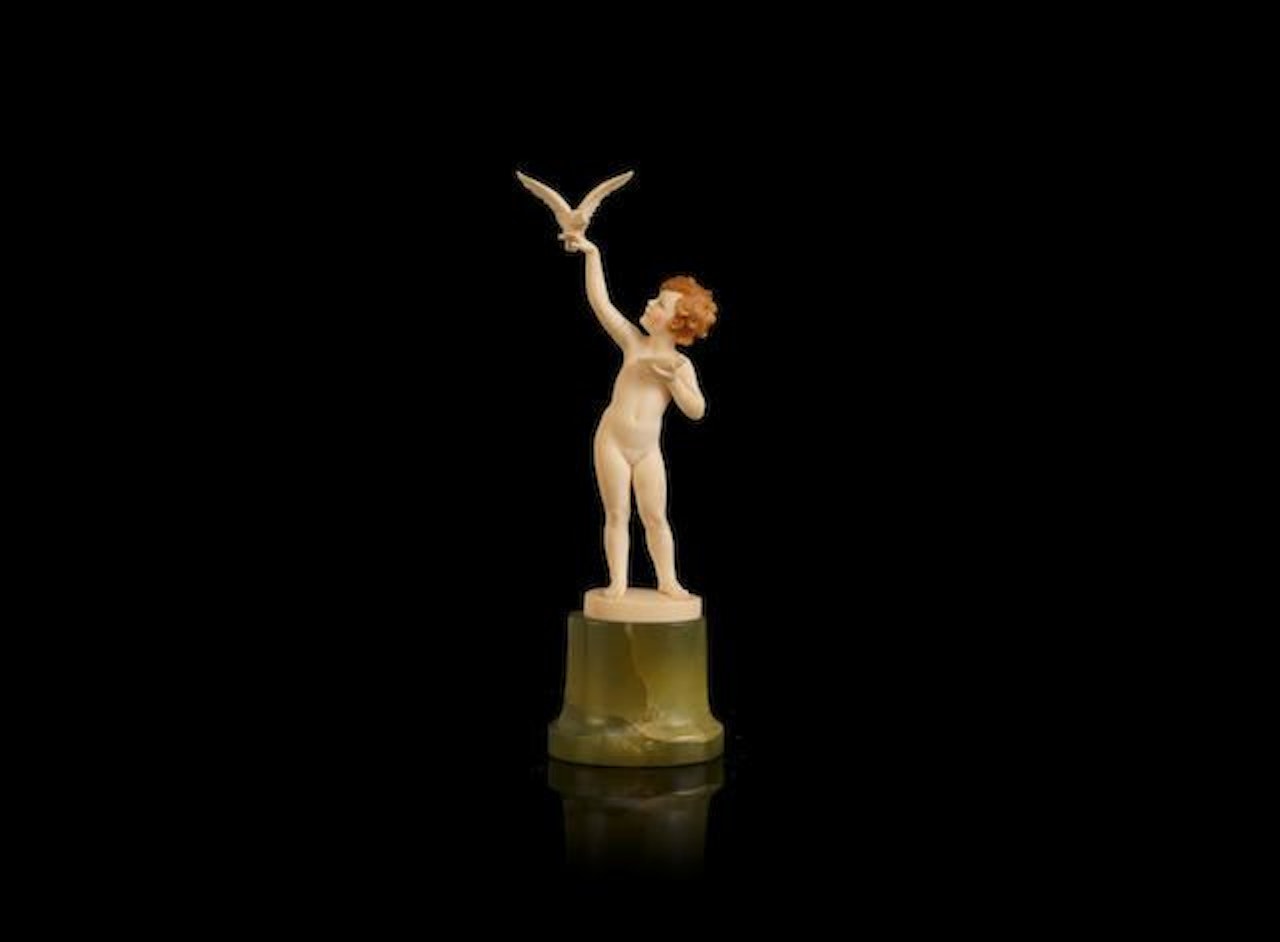 Girl Feeding Bird by Ferdinand Preiss