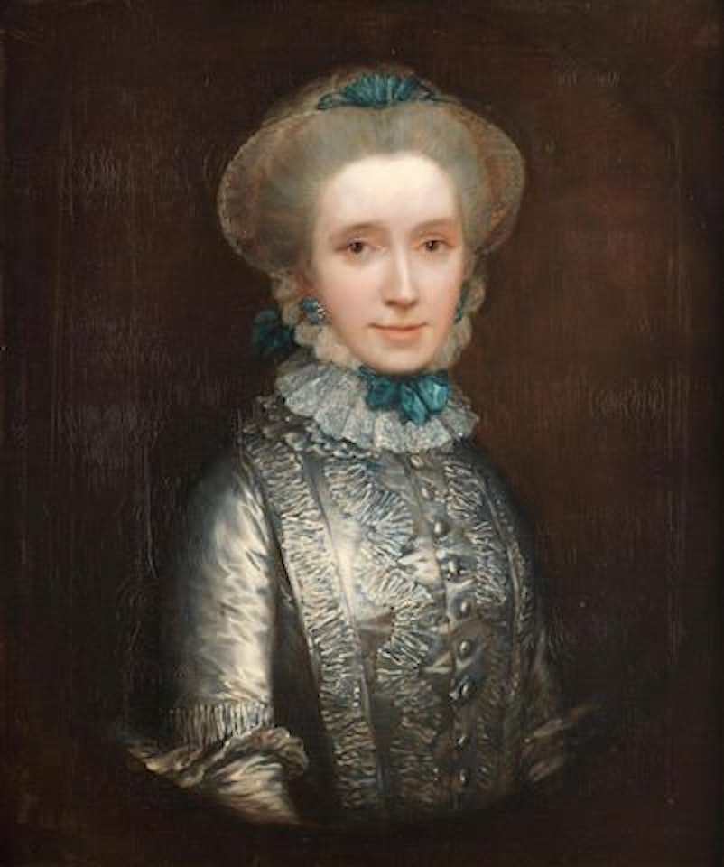 Portrait of Lady Caroline Draper (circa 1730-1769), half-length, in a blue dress with a white lace cap held with blue ribbons, within a painted oval by Thomas Gainsborough