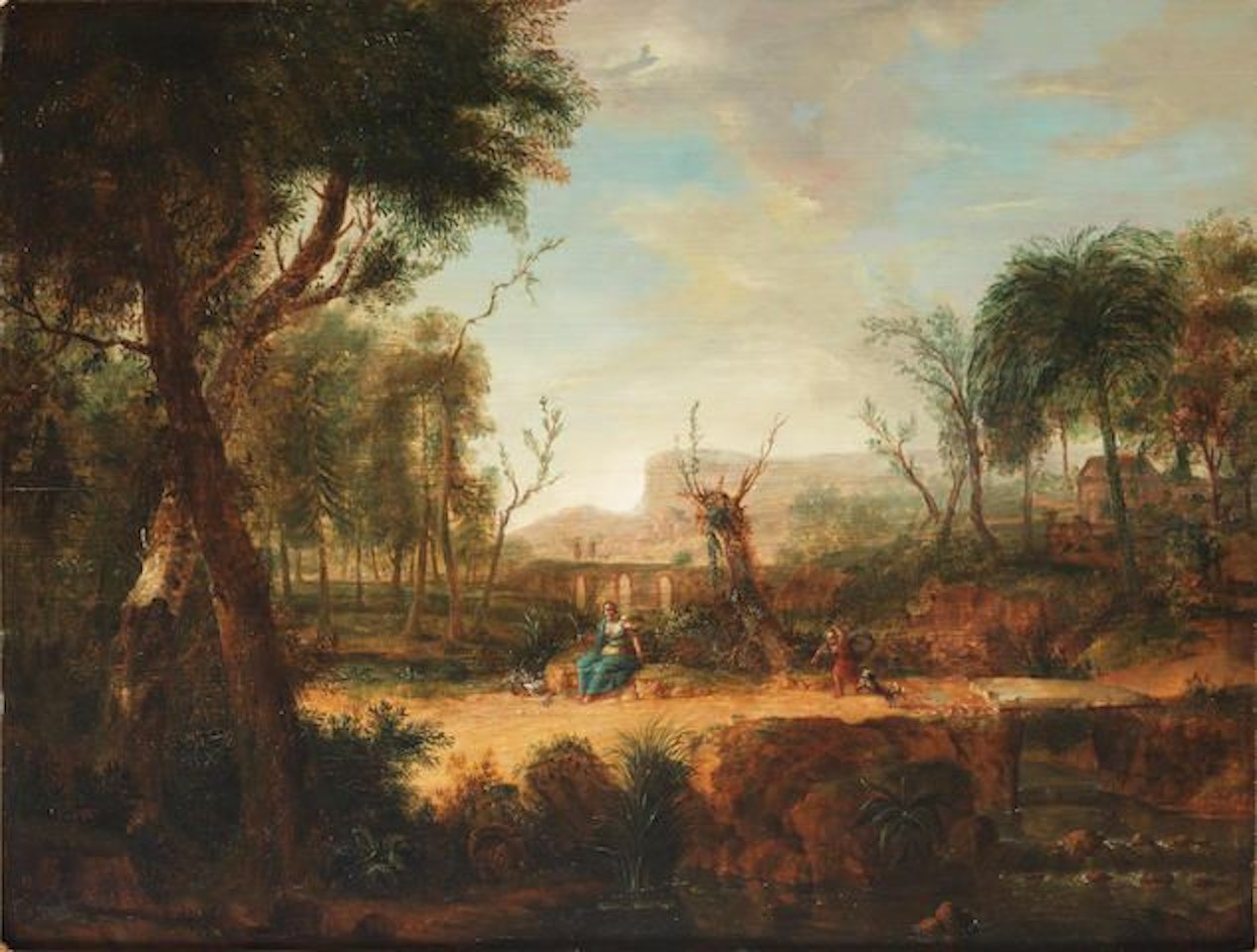 A woman seated with a basket of flowers with a child playing with a dog, in a wooded landscape by German School