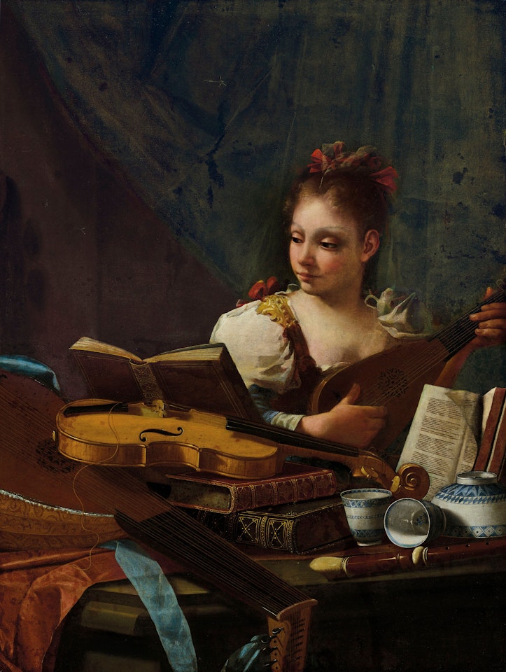 A girl playing a mandolin, with a lute, a viol, books and blue and white porcelain on a table by Cristoforo Munari