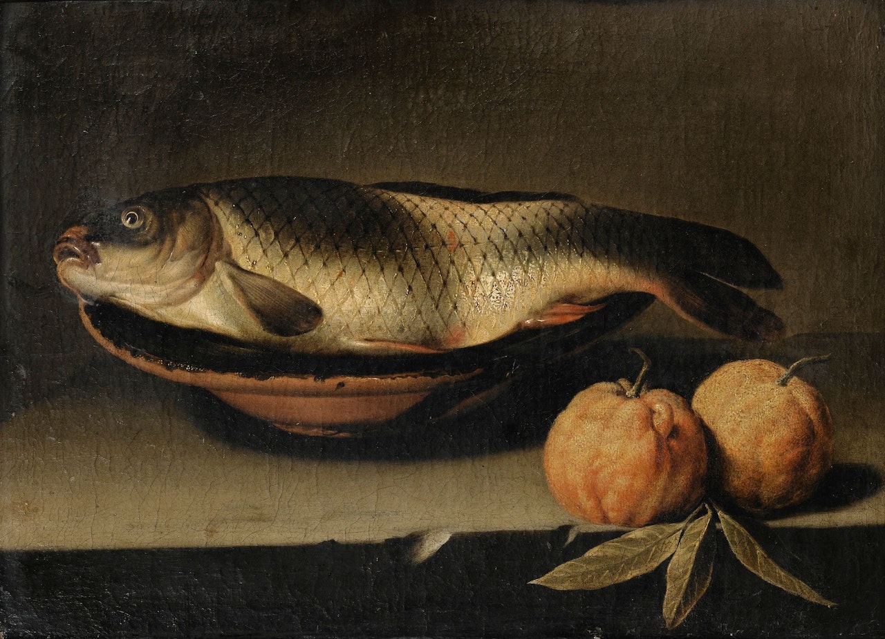 STILL LIFE WITH A CARP AND TWO BITTER ORANGES ON A STONE LEDGE by Sebastian Stosskopf