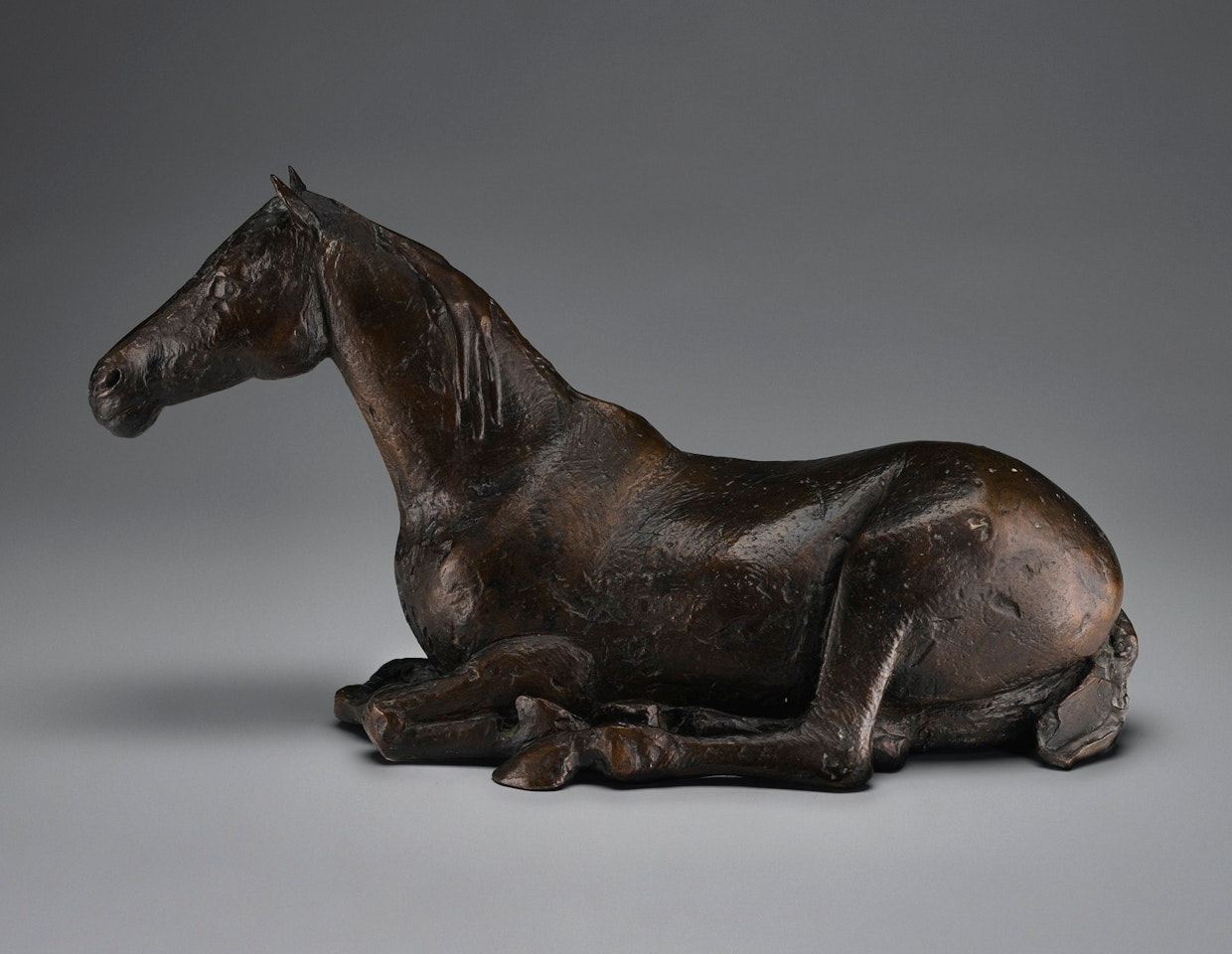 LYING DOWN HORSE by Elisabeth Frink