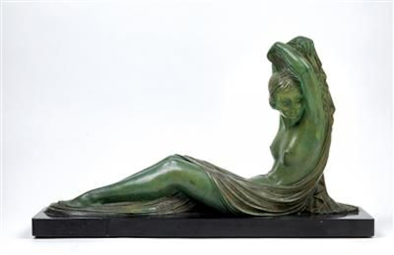 Recumbent female nude looking to the side by Demetre Chiparus