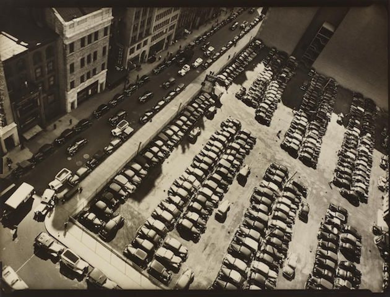 Rockefeller Center Parking Square, 40 W. 49th Street, Manhattan, from The Museum of Modern Art, 5th floor, 14 West 49th Street, Manhattan, June 29, 1938 by Berenice Abbott