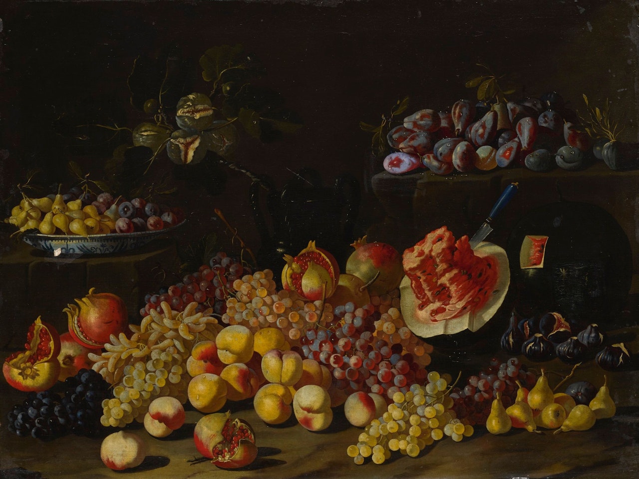 AN ELABORATE STILL LIFE OF VARIOUS FRUITS, INCLUDING POMEGRANATES, GRAPES, MELONS, PEACHES, PLUMS, AND PEARS by Giuseppe Recco