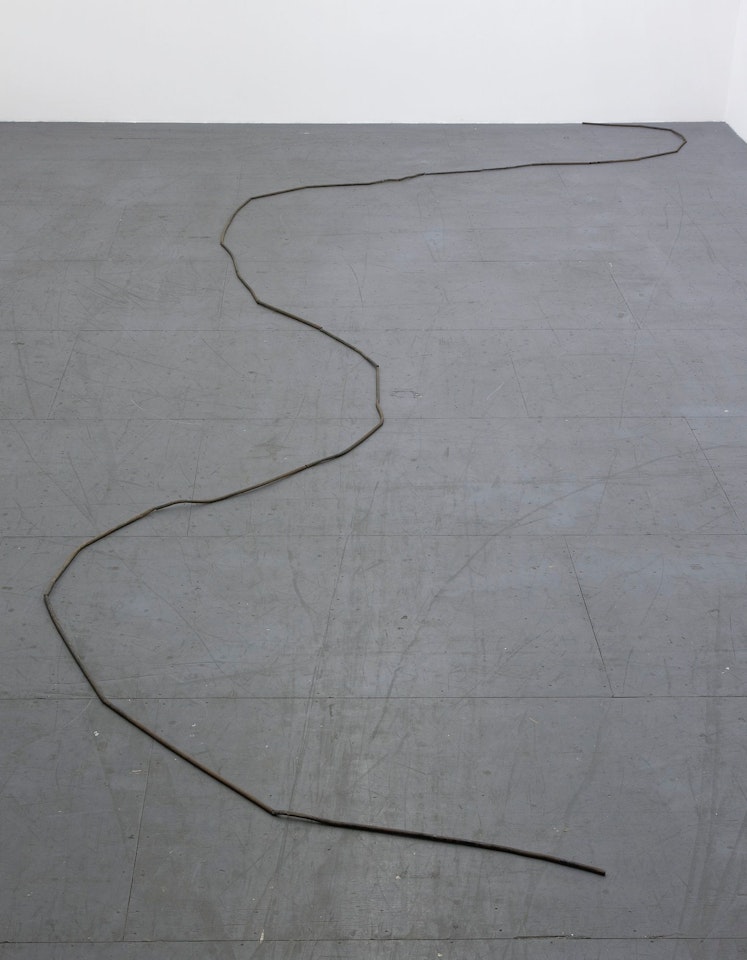 26 STRAIGHT SHORT PIPE RUN by Carl Andre