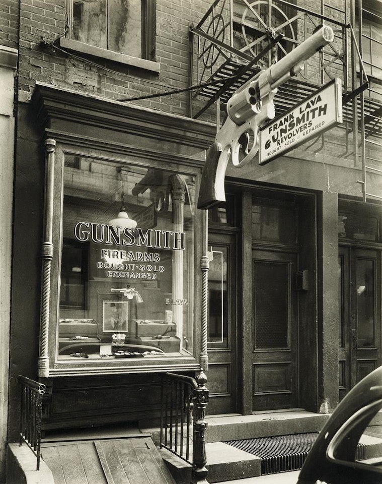 Frank Lava Gunsmith. 6 Center Market Place, Manhattan (between Broome And Grand Street) by Berenice Abbott