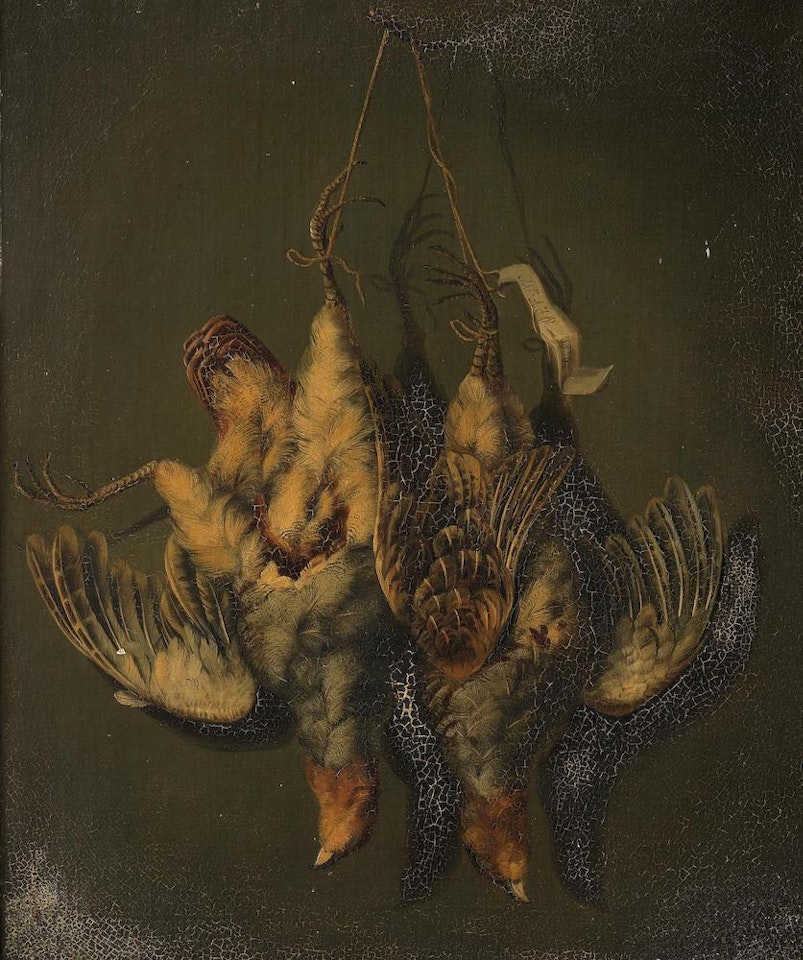 Two hanging dead partridges by German School