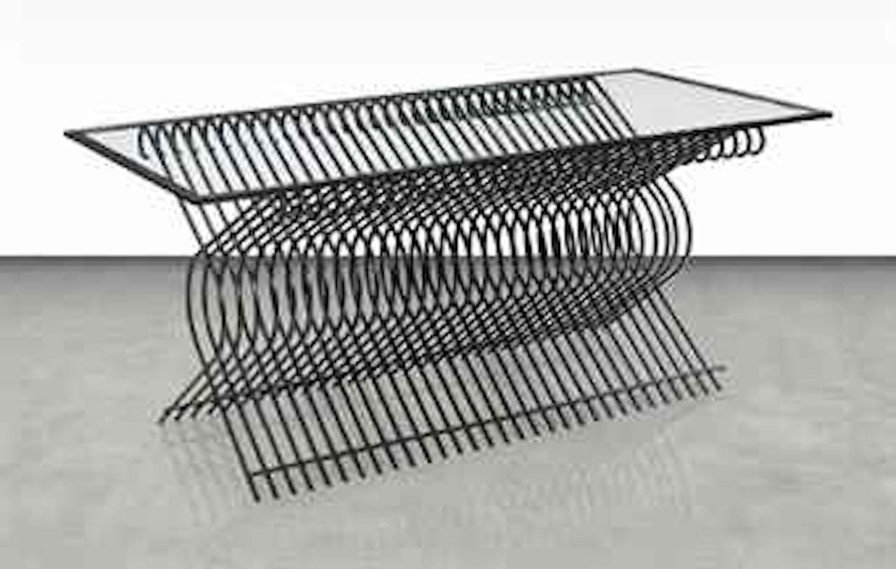 A 'PALM BEACH' DINING TABLE by Mathieu Mategot