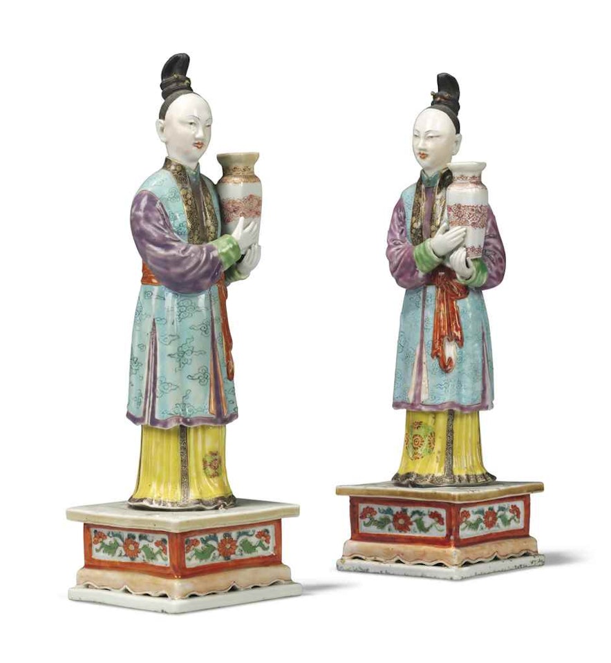 A PAIR OF CHINESE FAMILLE ROSE 'LADY' CANDLE-HOLDERS by Anonymous
