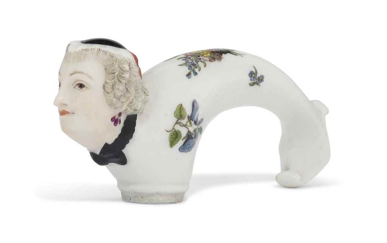 A MEISSEN FRAUENKOPF CANE-HANDLE by Anonymous
