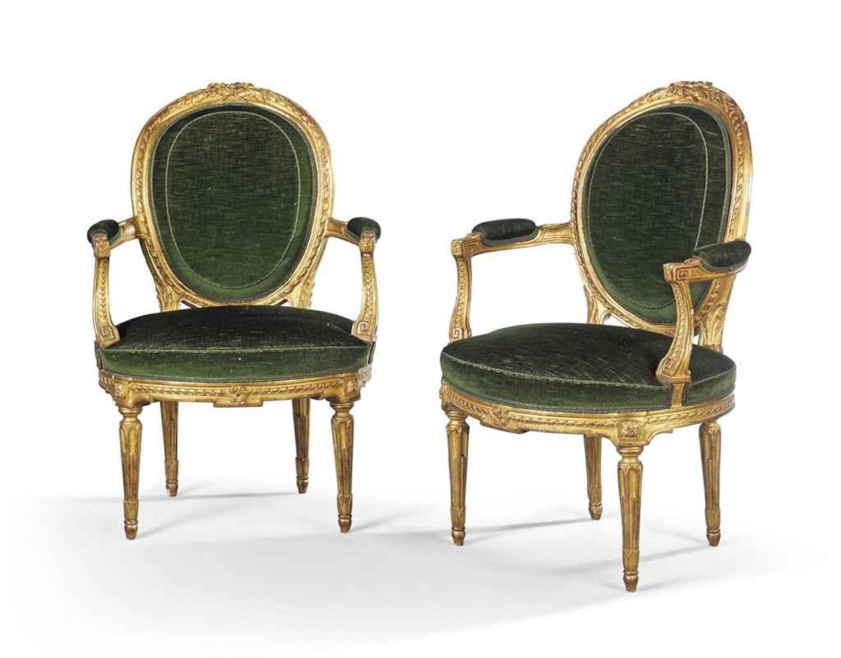 A PAIR OF LOUIS XVI GILTWOOD FAUTEUILS BY PIERRE BRIZARD by Anonymous