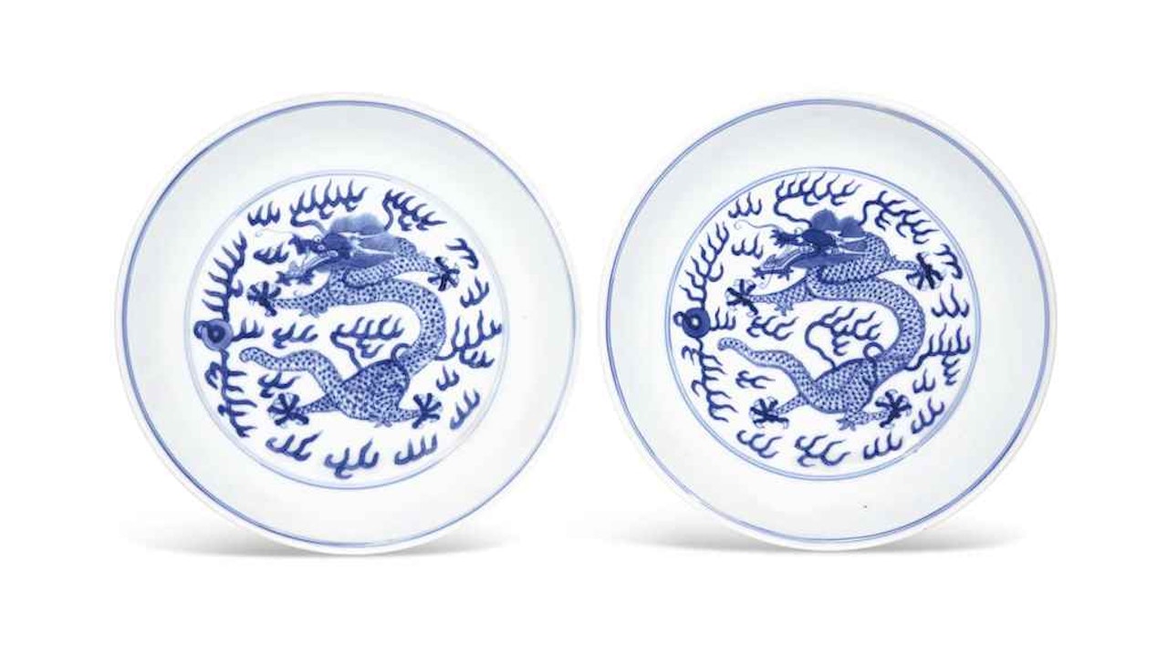 A PAIR OF BLUE AND WHITE 'DRAGON' DISHES by Anonymous
