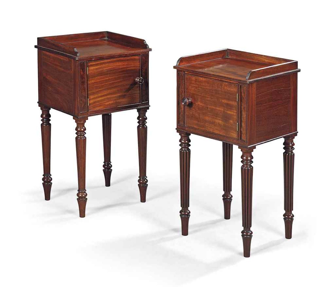 A MATCHED PAIR OF REGENCY MAHOGANY BEDSIDE CABINETS by Anonymous