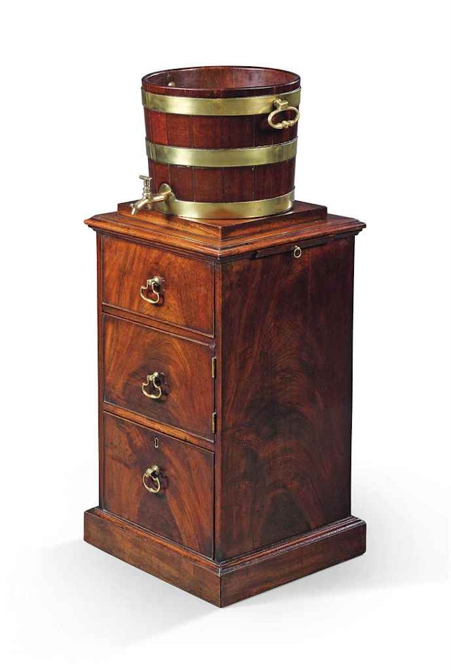 A GEORGE III BRASS-BOUND DINING-ROOM CISTERN by Anonymous