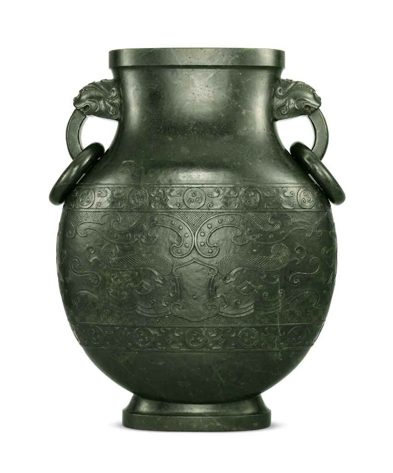 A LARGE DARK-GREEN JADE ARCHAISTIC VASE, BIANHU by Anonymous