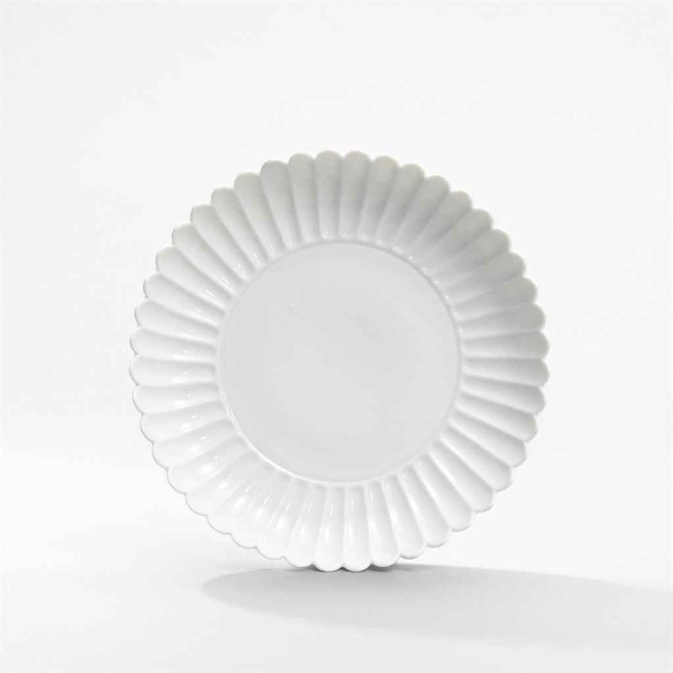 A RARE WHITE-GLAZED ‘CHRYSANTHEMUM’ DISH by Anonymous