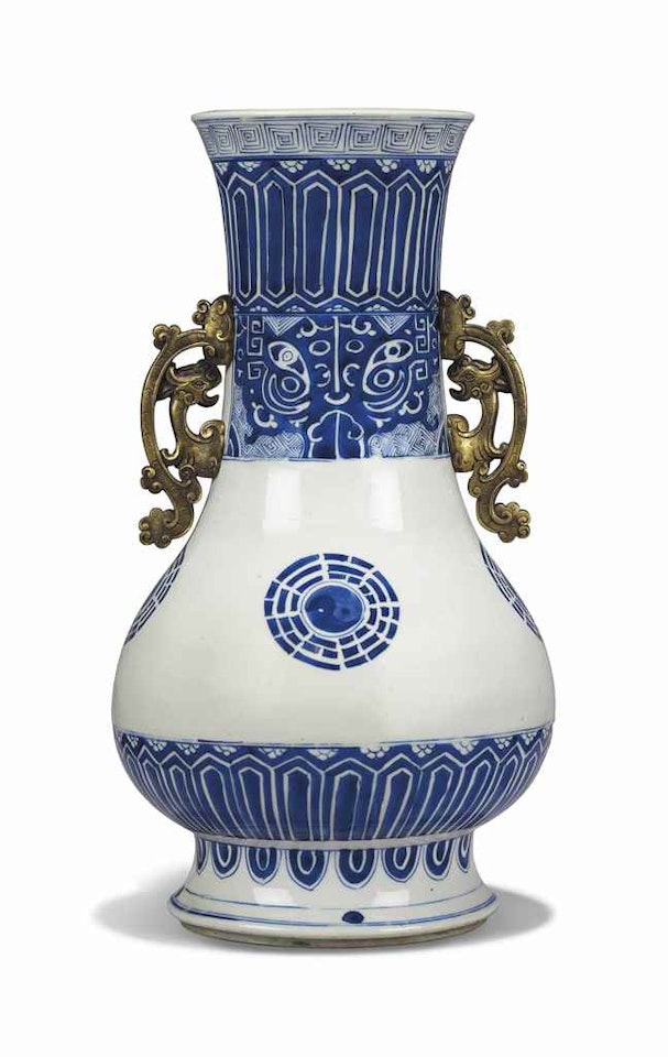 A CHINESE GILT-BRONZE-MOUNTED BLUE AND WHITE PEAR-SHAPED VASE by Anonymous