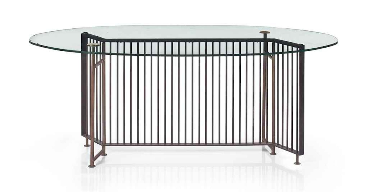 A DINING TABLE by Mathieu Mategot