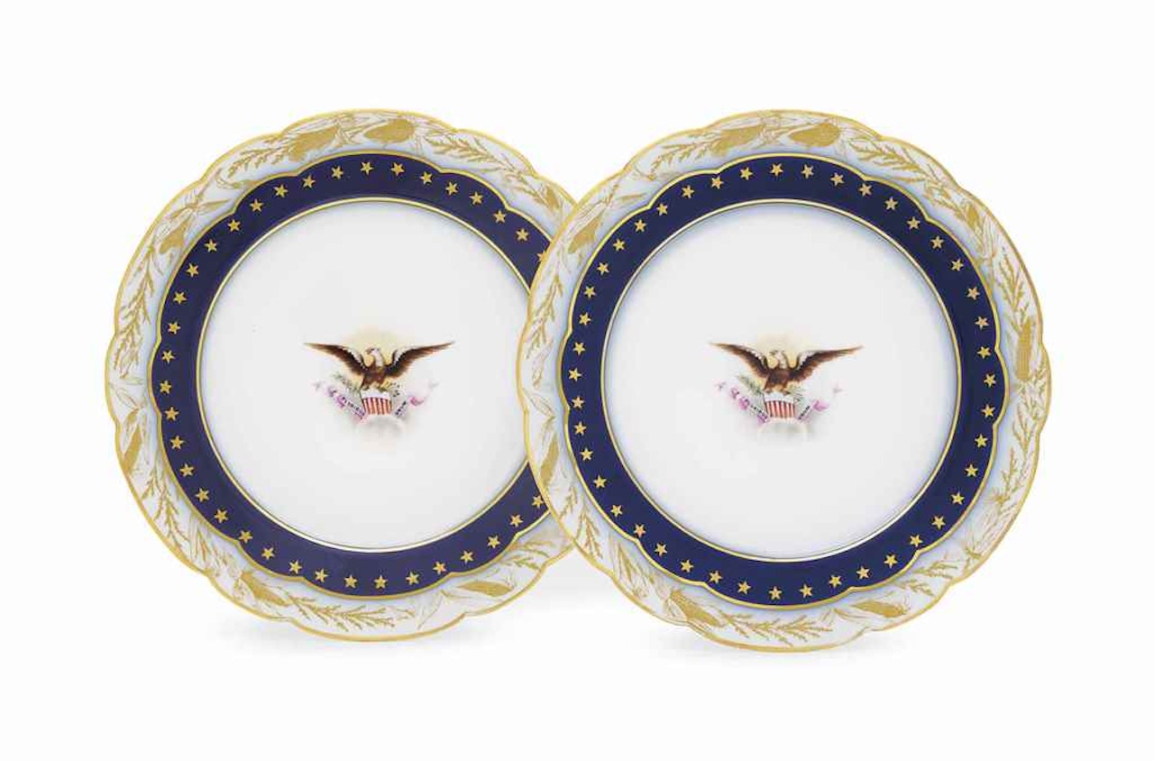 TWO LIMOGES PORCELAIN COBALT-BLUE GROUND PLATES by Anonymous