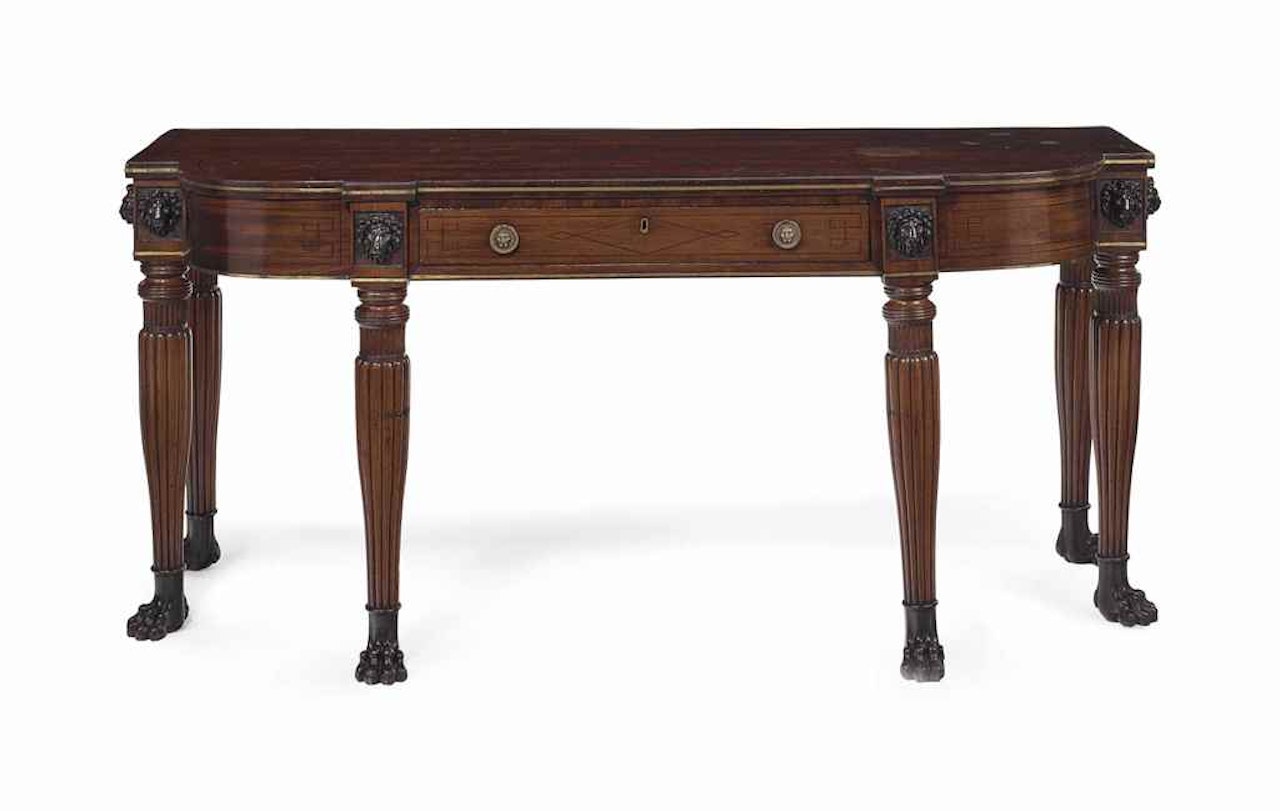 A REGENCY BRASS-INLAID MAHOGANY SERVING TABLE by Anonymous