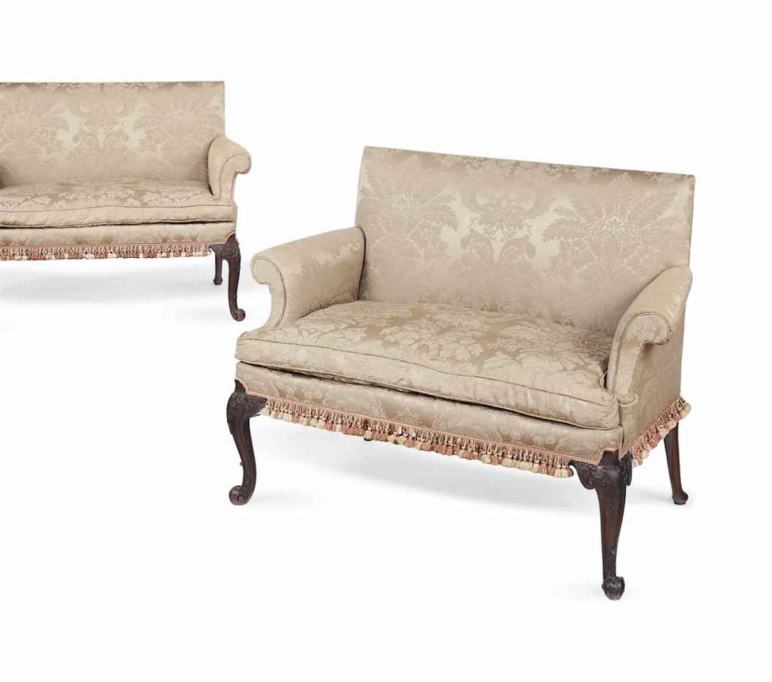 A PAIR OF GEORGE II MAHOGANY SETTEES by Anonymous