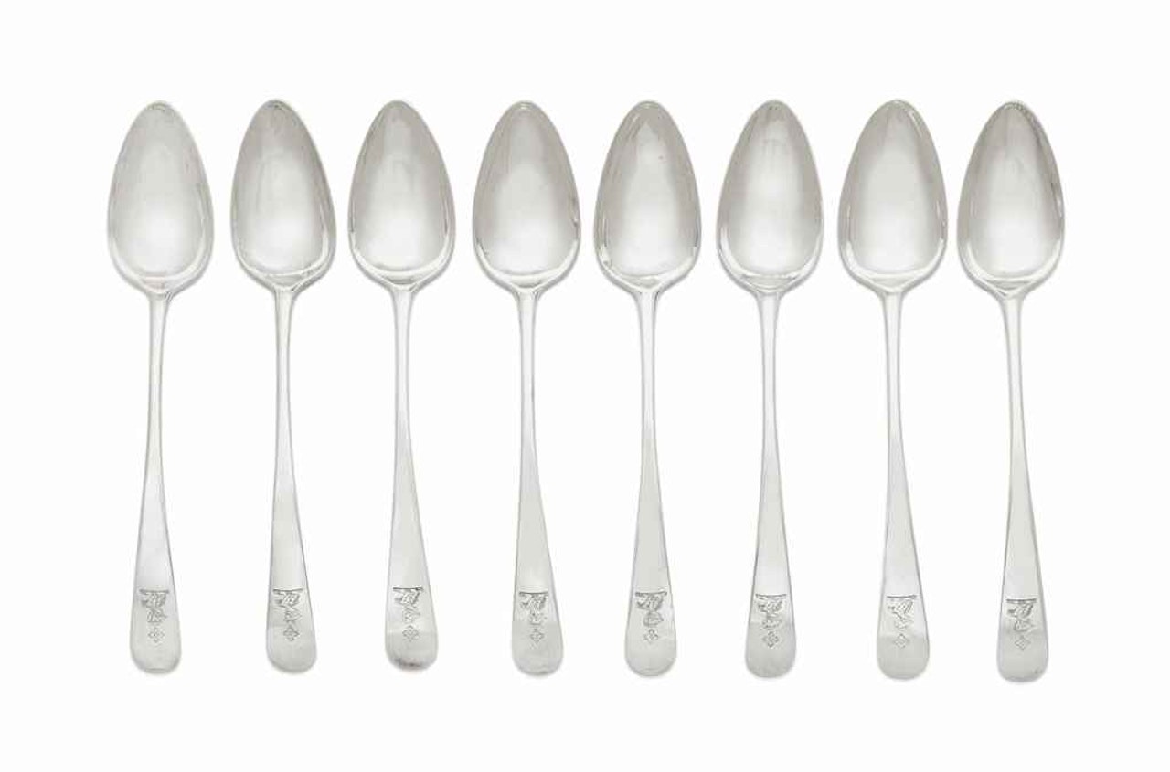 A GROUP OF EIGHT SILVER TABLESPOONS by Anonymous