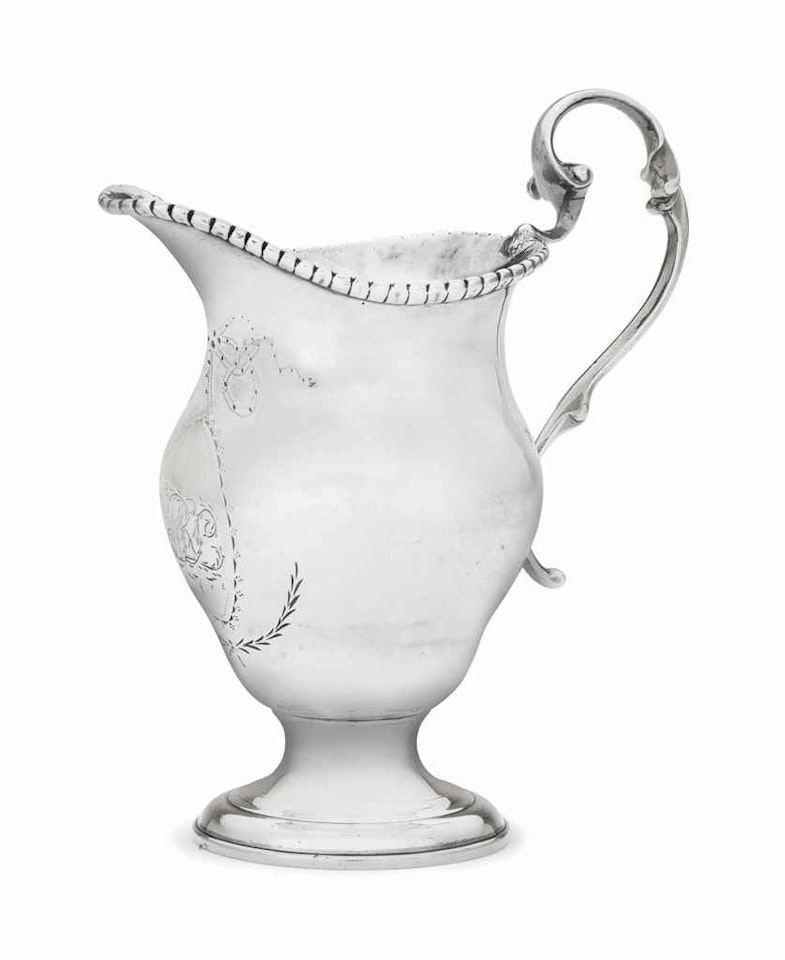 A SILVER MILK POT by Anonymous