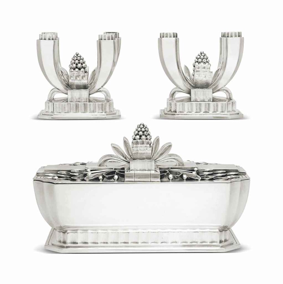 AN IMPORTANT AMERICAN MODERNE SILVER THREE-PIECE TABLE GARNITURE, DESIGNED BY OSCAR RIEDENER by Anonymous