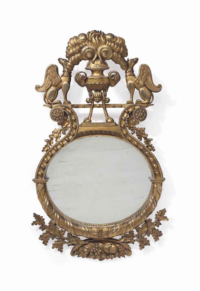 A CLASSICAL GILTWOOD LYRE-FORM LOOKING GLASS by Anonymous