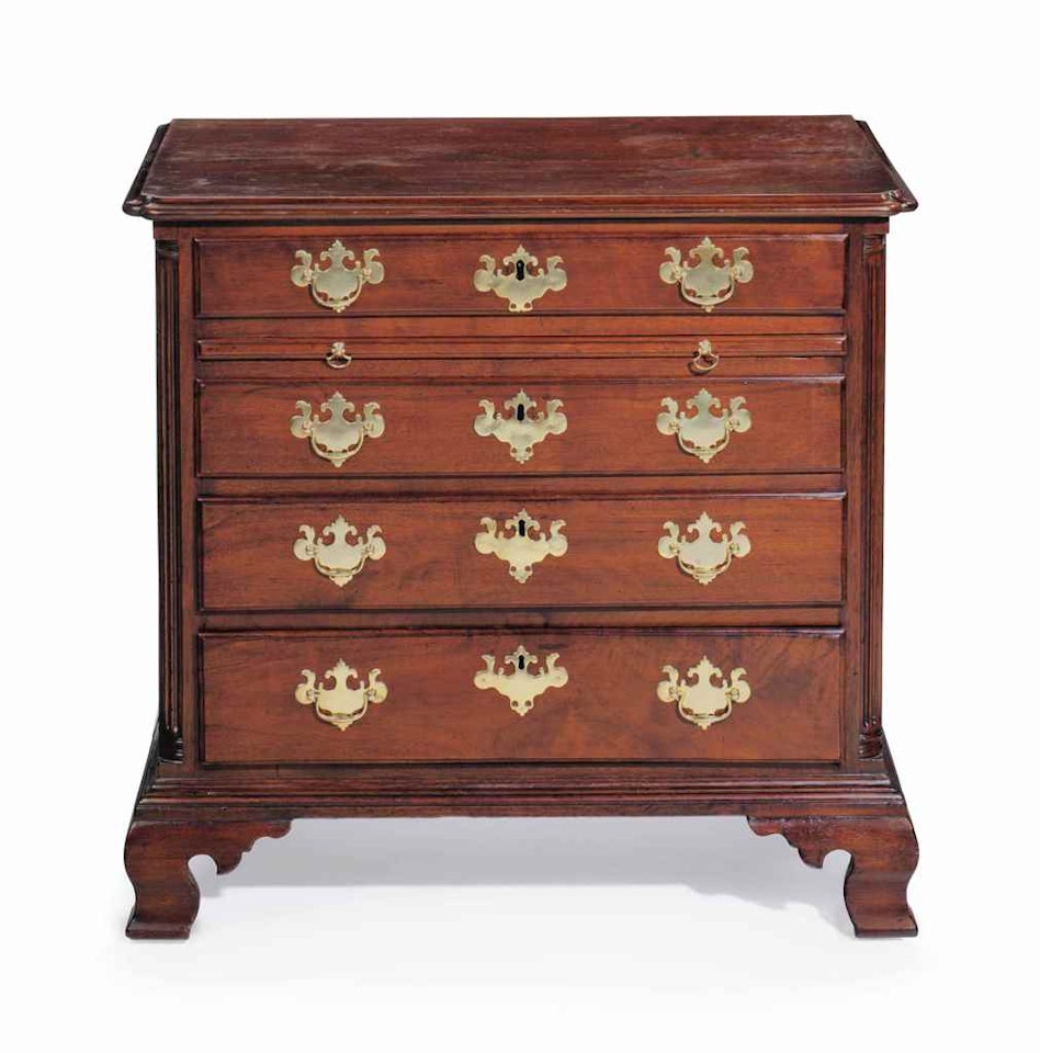 A DIMINUTIVE CHIPPENDALE FIGURED WALNUT CHEST-OF-DRAWERS by Anonymous