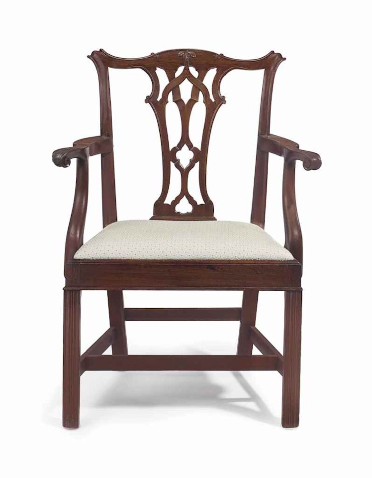 A CHIPPENDALE CARVED MAHOGANY ARMCHAIR by Anonymous